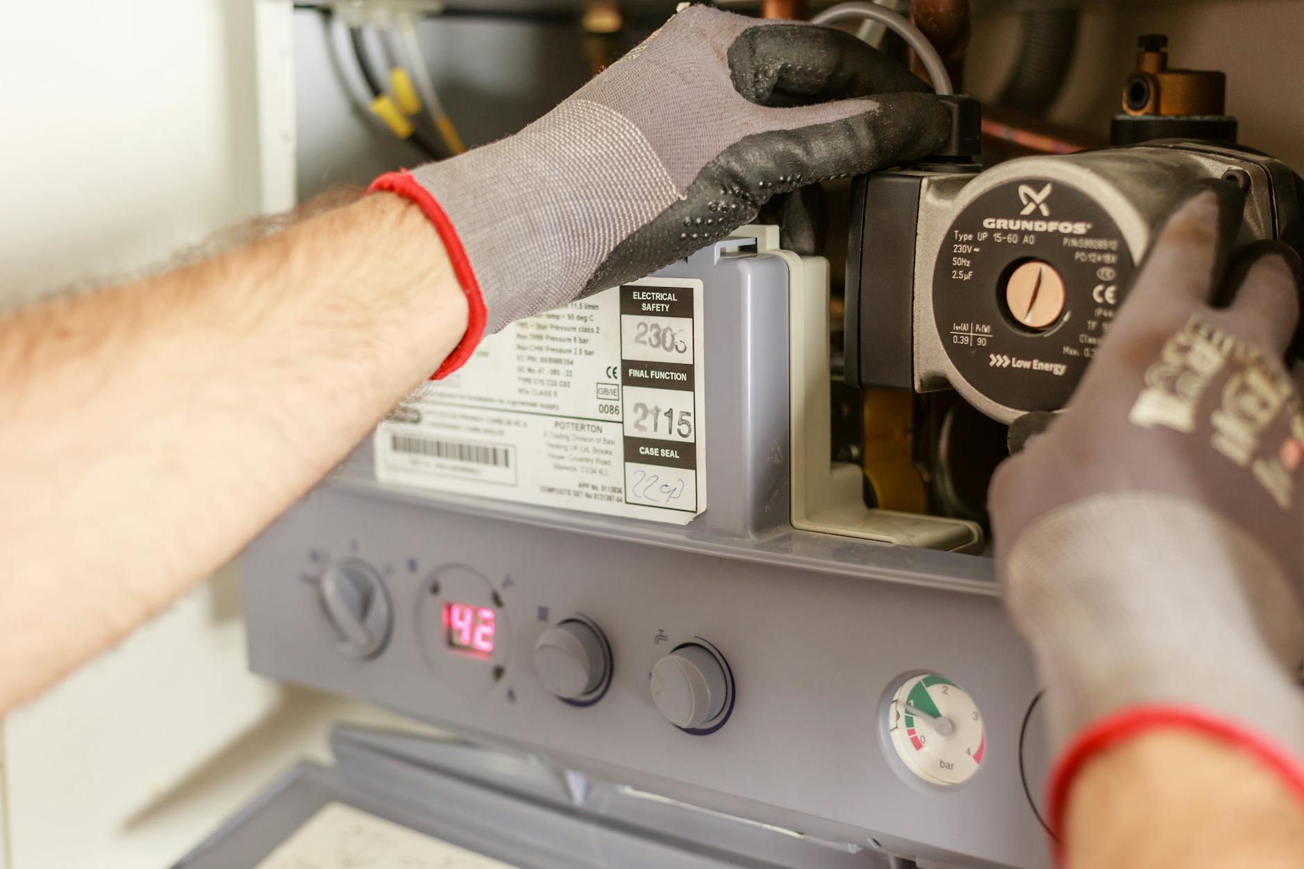 Plumbing boiler maintenance work close-up